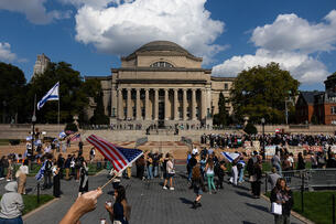 A photograph of pro-Israel and pro-Palestine demonstrators on Columbia University's campus. 