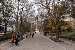 A photograph of students walking on Cornell University's campus.