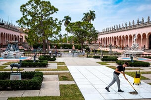 A worker cleans in the event area of the Ringling Brothers Museum in Sarasota, Fla.