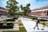 A worker cleans in the event area of the Ringling Brothers Museum in Sarasota, Fla.