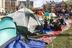Tents are set up outside of the library at the University of Wisconsin–Madison